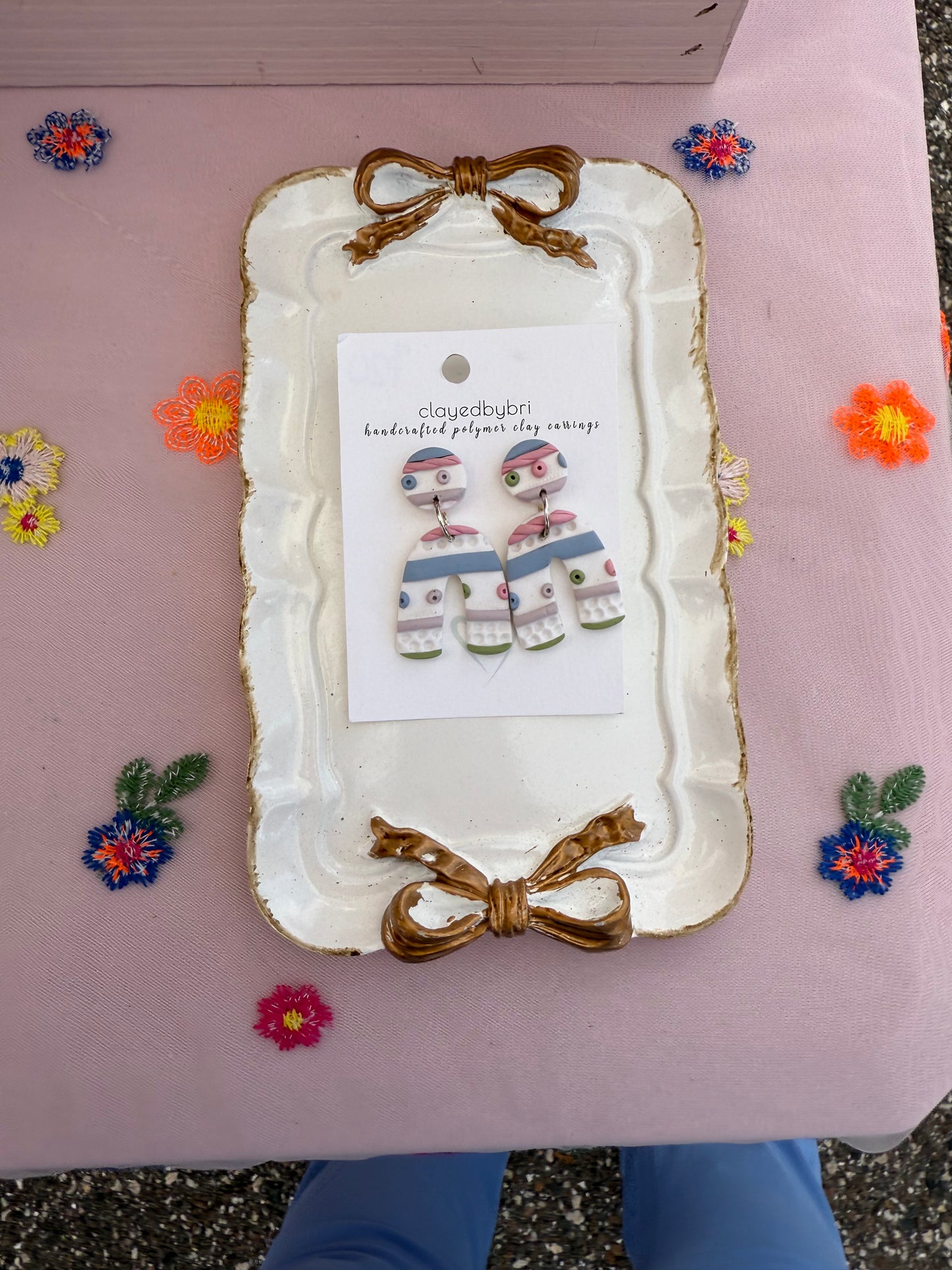 White with Pink, Green, and Blue Design