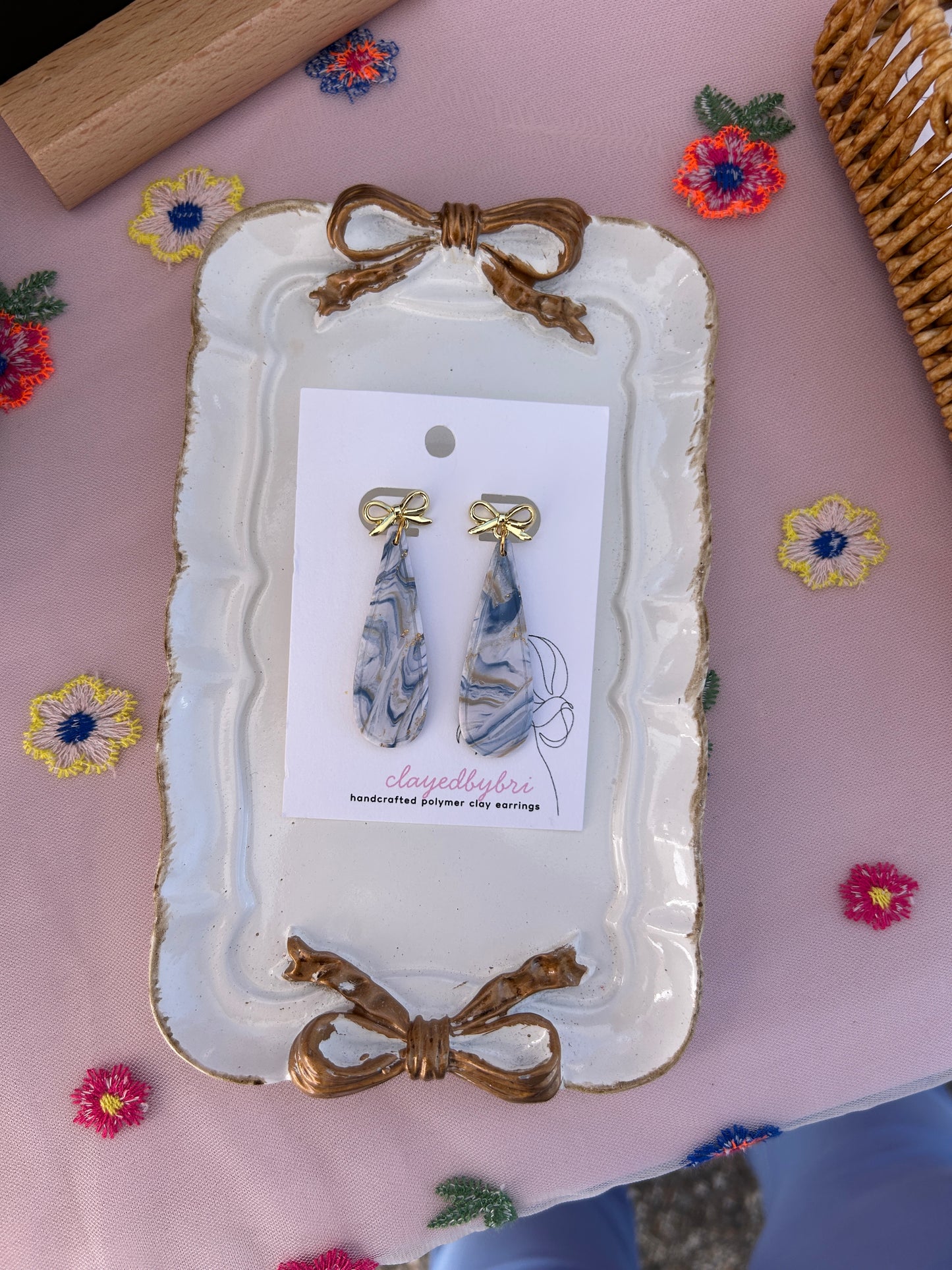 Marbled Blue and Gray Dangle Earrings, with a Gold Bow